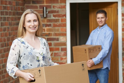 Moving team planning a Fulham home relocation on a residential street