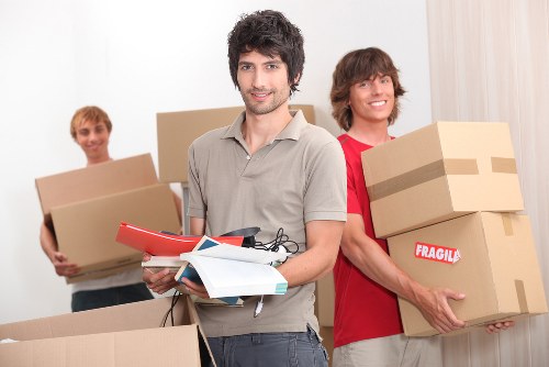 Packed boxes and furniture ready for a house move in Fulham