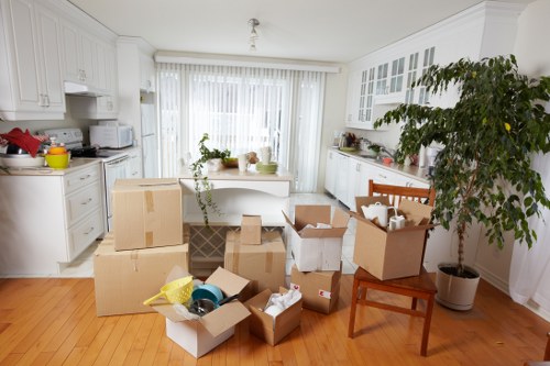 Professional movers handling a flat move in Fulham with care