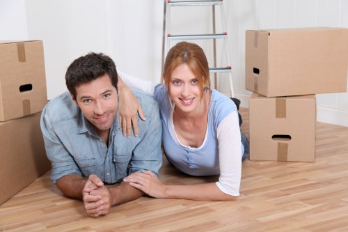 Professional movers transporting office items in Fulham