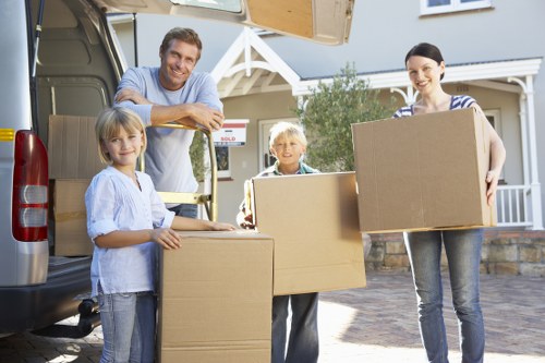 Packing boxes and furniture for a local move in Fulham