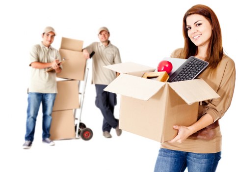 Team handling furniture and transport arrangements during a move