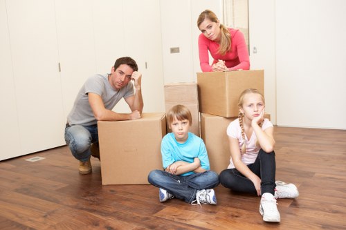 Professional man and van helping with a flat move in Fulham