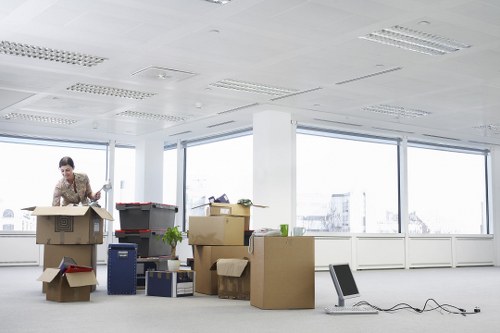Movers handling stairs and access in a Fulham flat building