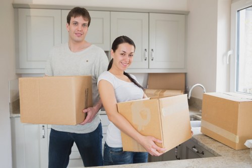 Packed boxes and household items ready for removal